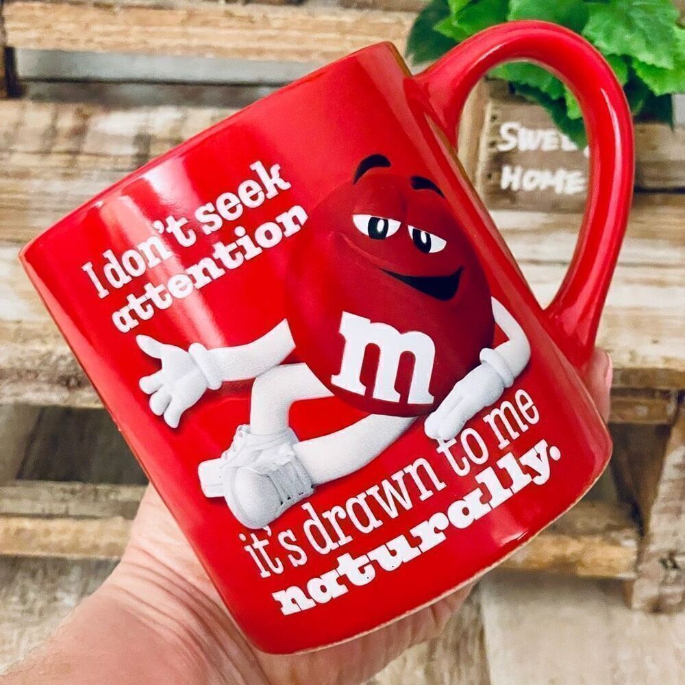 New m&m’s Funny Red I don’t seek attention it’s drawn to me naturally Coffee Mug